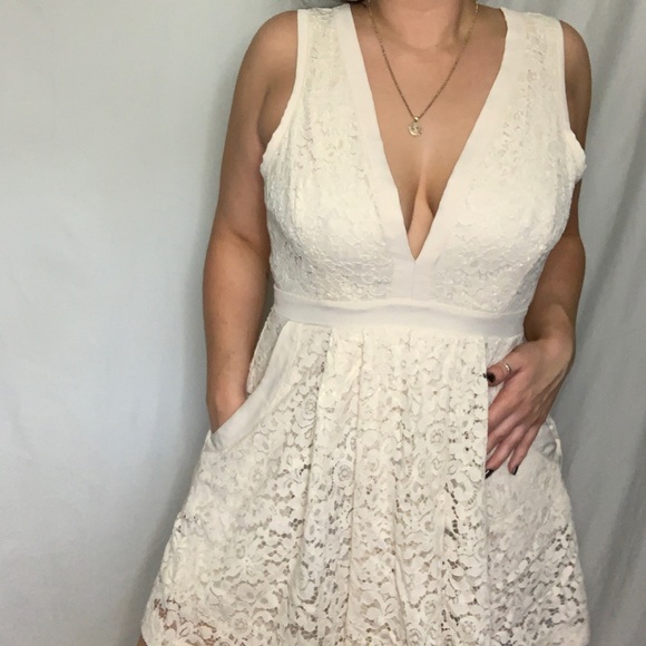 white lace dress with pockets